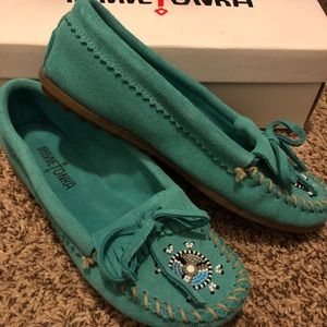 Minnetonka turquoise slip ons